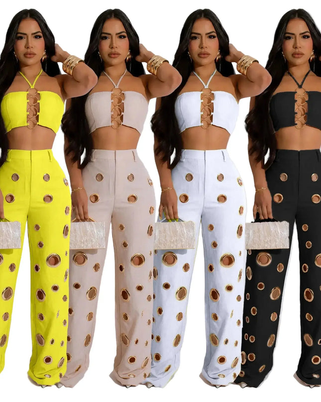 Four women wearing matching outfits with polka dot patterns on a white background