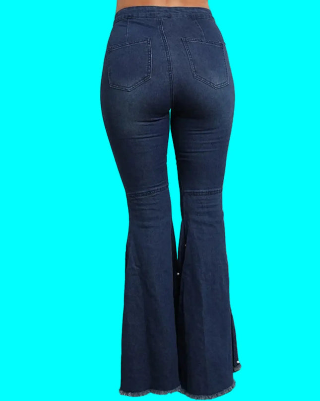 Blue flared jeans on a turquoise background