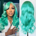 Person with teal hair and a close-up of the wig on a white background