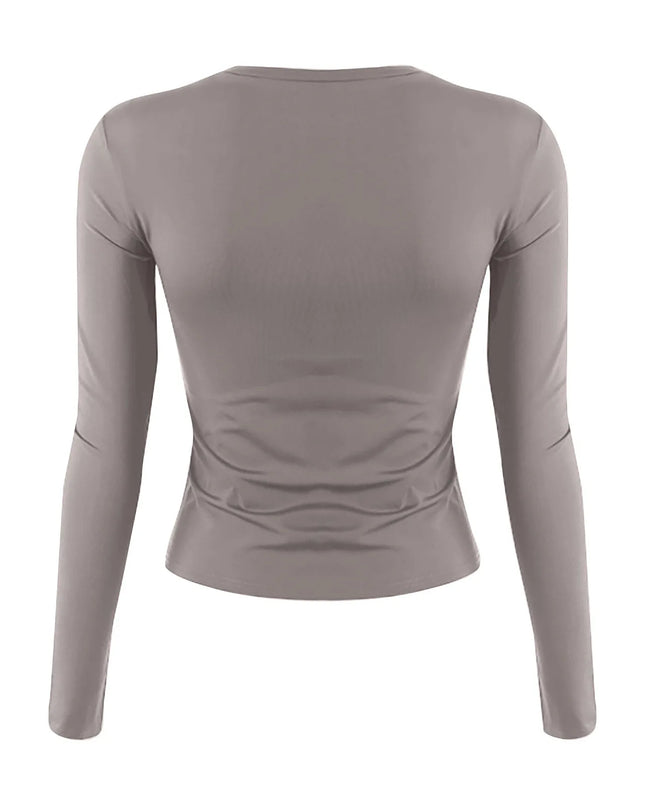 Back view of women's long sleeve crop top in brown showing slim fit and O-neck design.