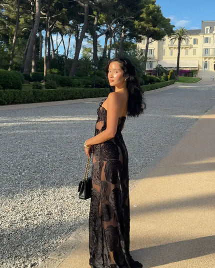 Model wearing Oligai one shoulder elegant dress in an outdoor setting, showcasing a sexy mesh design and bodycon fit.