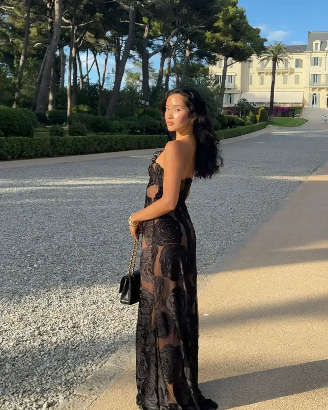 Model wearing Oligai one shoulder elegant dress in an outdoor setting, showcasing a sexy mesh design and bodycon fit.