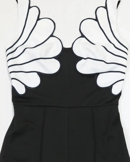 Black dress with white abstract patterns on a white background