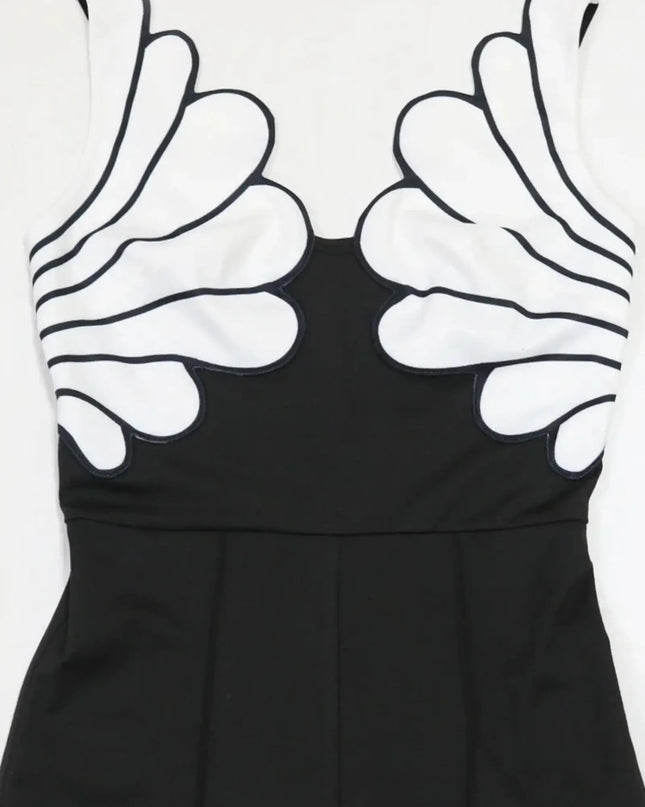 Black dress with white abstract patterns on a white background