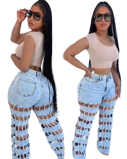 Woman wearing a beige top and checkered jeans against a white background