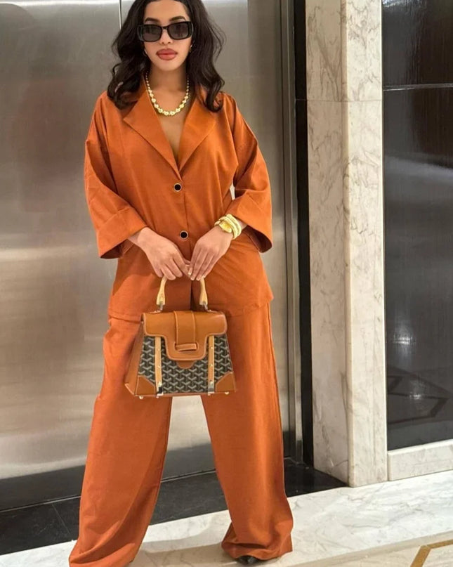 A woman wearing a stylish women's casual suit featuring a lapel shirt and high waist straight pants in orange.