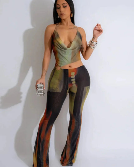 Woman wearing a colorful outfit with a plain background