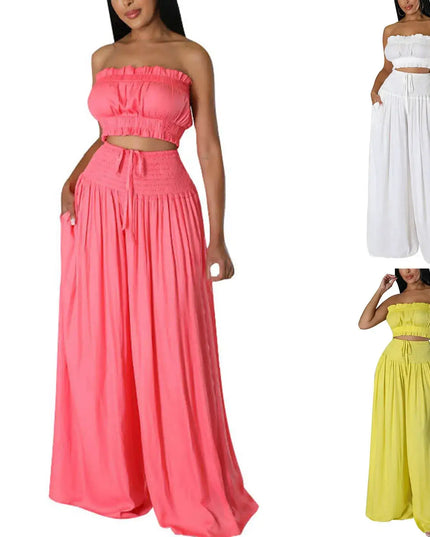 Women’s stylish solid color strapless two-piece outfits in pink, white, and yellow with wide-leg pants.