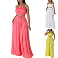 Women’s stylish solid color strapless two-piece outfits in pink, white, and yellow with wide-leg pants.