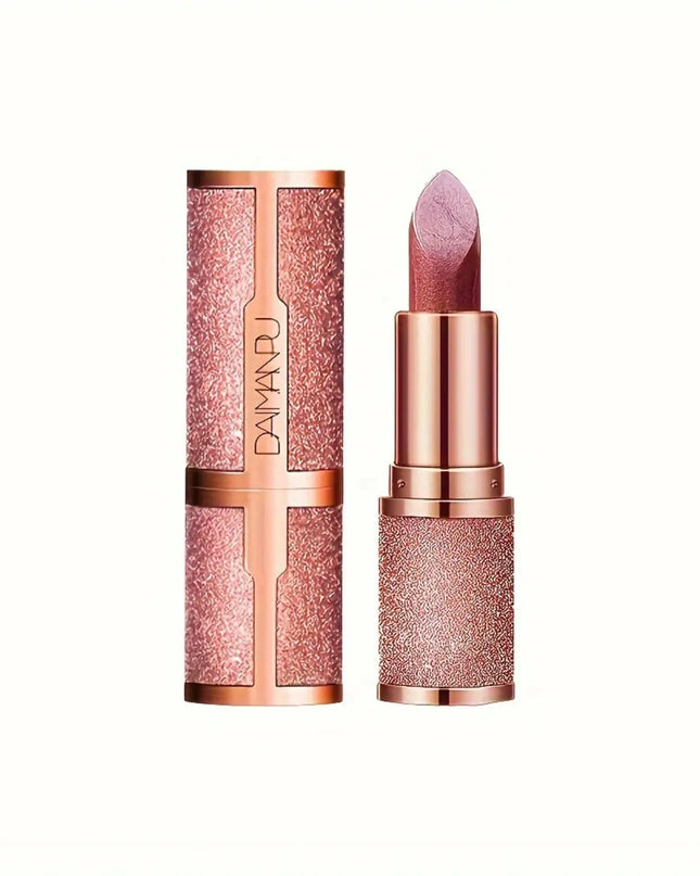 Rose gold lipstick with glittery finish and matching case on a white background