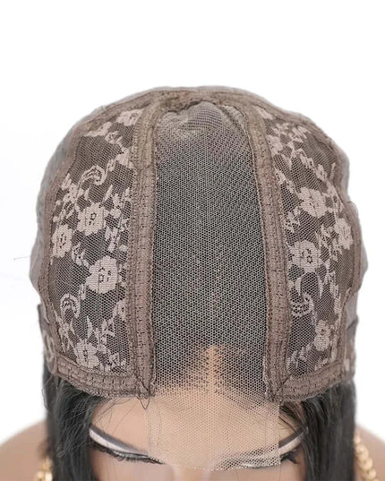 Swiss lace cap of a 180 density human hair bob wig showing floral design details.