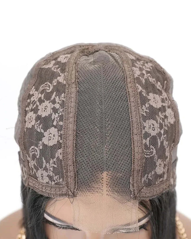 Swiss lace cap of a 180 density human hair bob wig showing floral design details.
