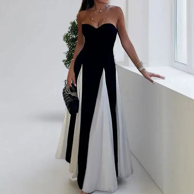 Elegant woman wearing a color contrast evening party dress with a V-neck and off-shoulder design, perfect for holiday occasions.