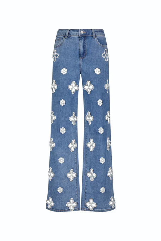 Casual hollow out women’s jeans with unique floral embroidery, featuring a loose straight fit and modern design.