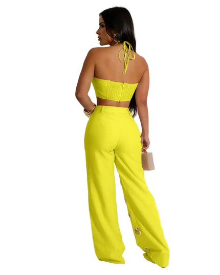 Woman wearing a bright yellow outfit against a white background