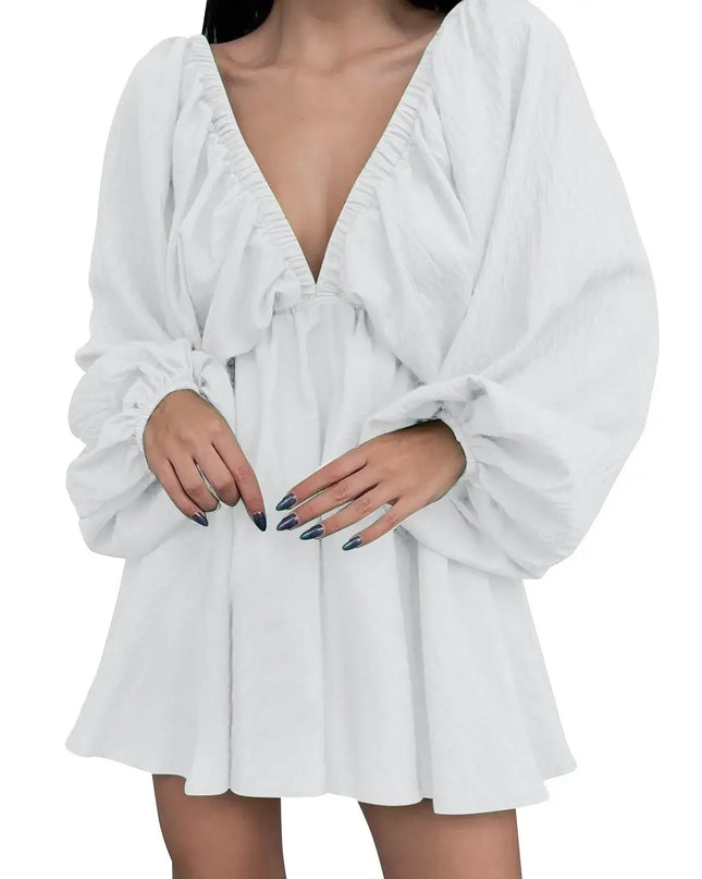 White robe worn by a person on a white background