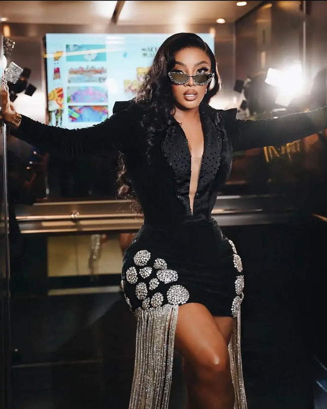 Sexy party dress with deep V neckline, beaded details, and tassel sleeves, perfect for custom made prom dresses.