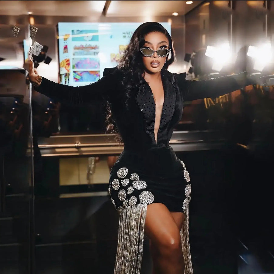 Sexy party dress with deep V neckline, beaded details, and tassel sleeves, perfect for custom made prom dresses.