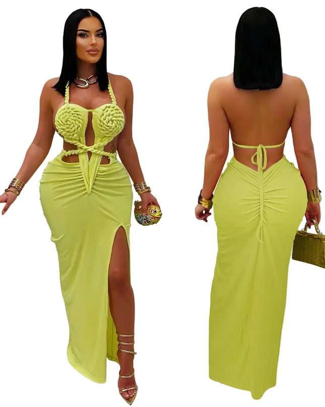 Woman wearing a bright green dress with a high slit, posing indoors.