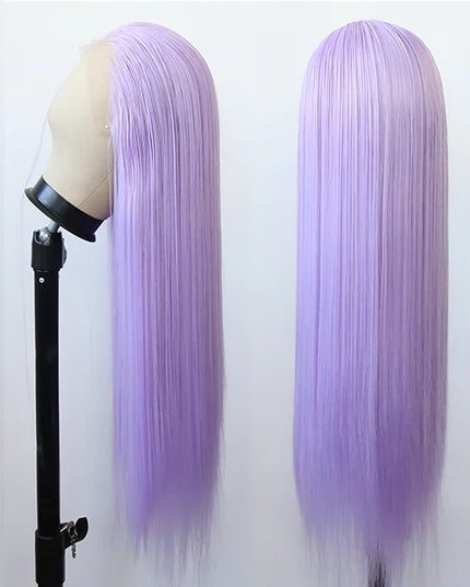 Four mannequin heads with purple wigs on stands against a white background