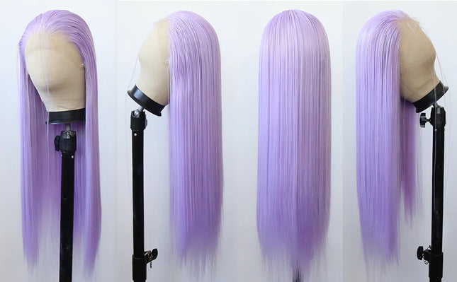 Four mannequin heads with purple wigs on stands against a white background