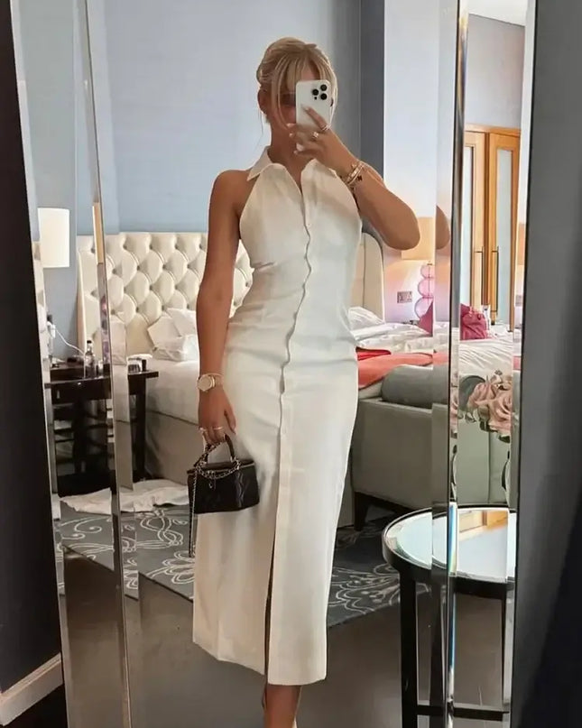 Woman in a halter backless white cotton linen summer dress posing in front of a mirror, showcasing casual summer style.