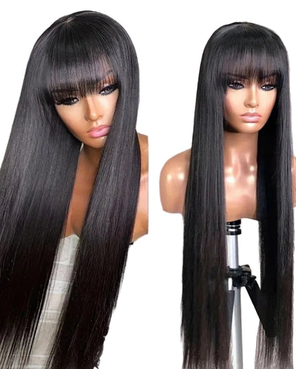 Two mannequin heads with long black wigs against a brick wall background.