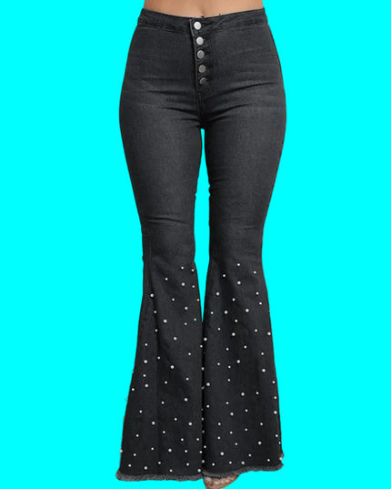 Black flared jeans with pearl embellishments on a neutral background