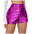 Shiny purple shorts worn by a person on a white background