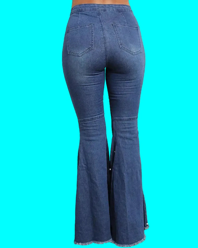 Blue flared jeans on a turquoise background