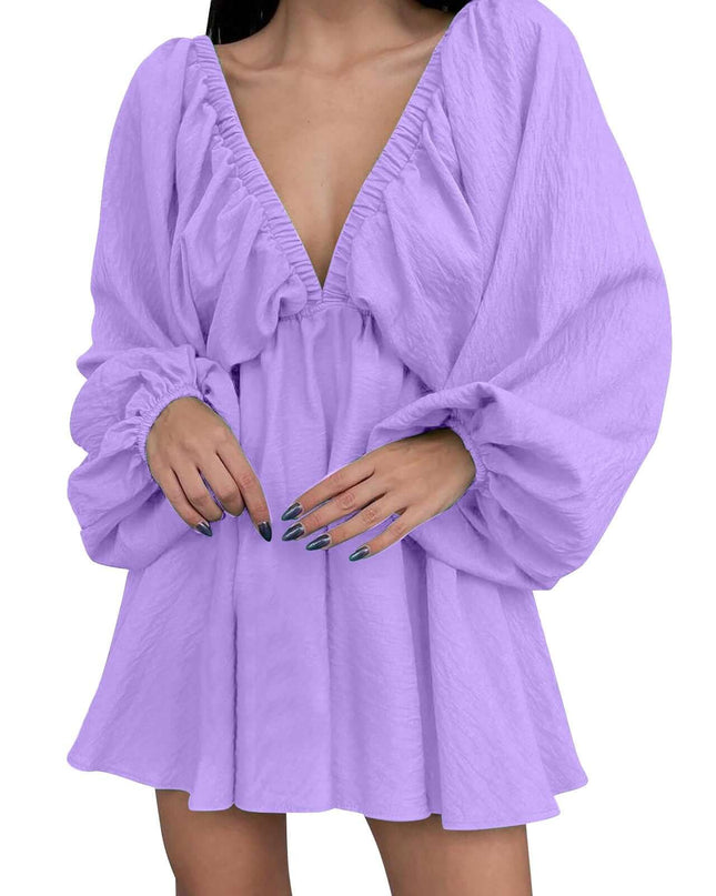 Purple dress with long sleeves on a white background