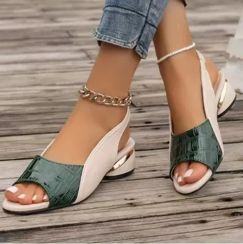Comfortable color block sandals featuring a stylish green and beige design with low heels, perfect for summer outings.