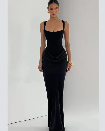 Model wearing a black sleeveless gown with a square neck and a fitted, elegant silhouette.