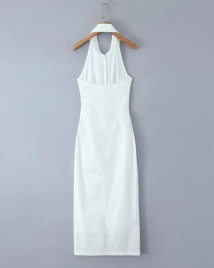 White cotton linen summer dress featuring a backless halter design and midi length, perfect for warm weather casual wear.