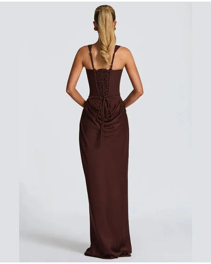 Back view of a model wearing a brown pleated maxi dress with square neck and sleeveless design.