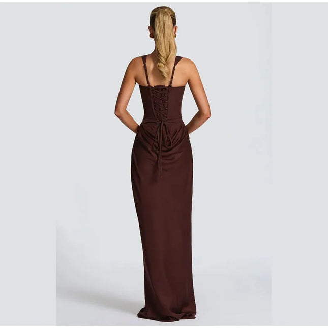 Back view of a model wearing a brown pleated maxi dress with square neck and sleeveless design.