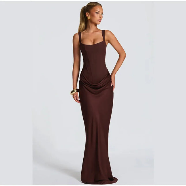 Brown pleated maxi dress square neck sleeveless gown on model, showcasing its elegant silhouette and flowing fit.