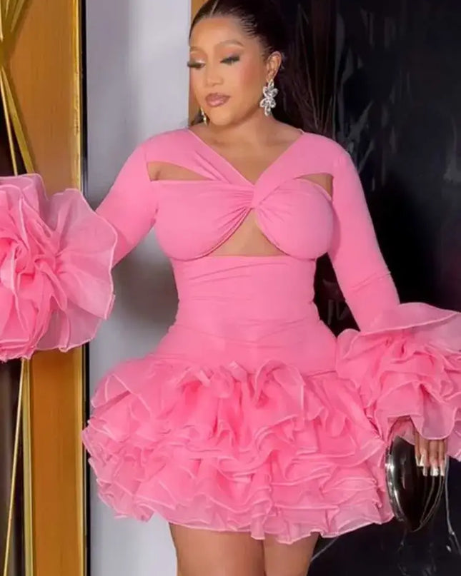 Sexy petal sleeve mini dress in pink with ruffled skirt and elegant petal sleeves, perfect for spring celebrations.