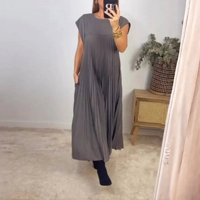 women's elegant sleeveless dress with pockets in grey, featuring pleats and a flowy design, perfect for casual outings.