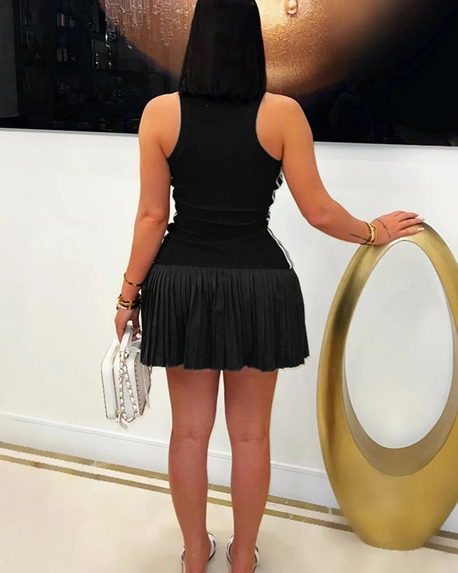 Back view of a woman in a black striped bodycon mini dress, showcasing a stylish and flattering design.