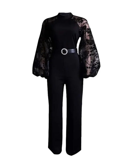 Black jumpsuit with sheer sleeves on a white background