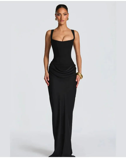 A model showcasing a sleek black gown with a square neck and sleeveless design, highlighting elegance and sophistication.