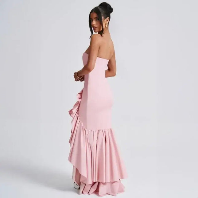 Sexy strapless summer dress in pink with a ruffled hem, showcasing a stylish back view.