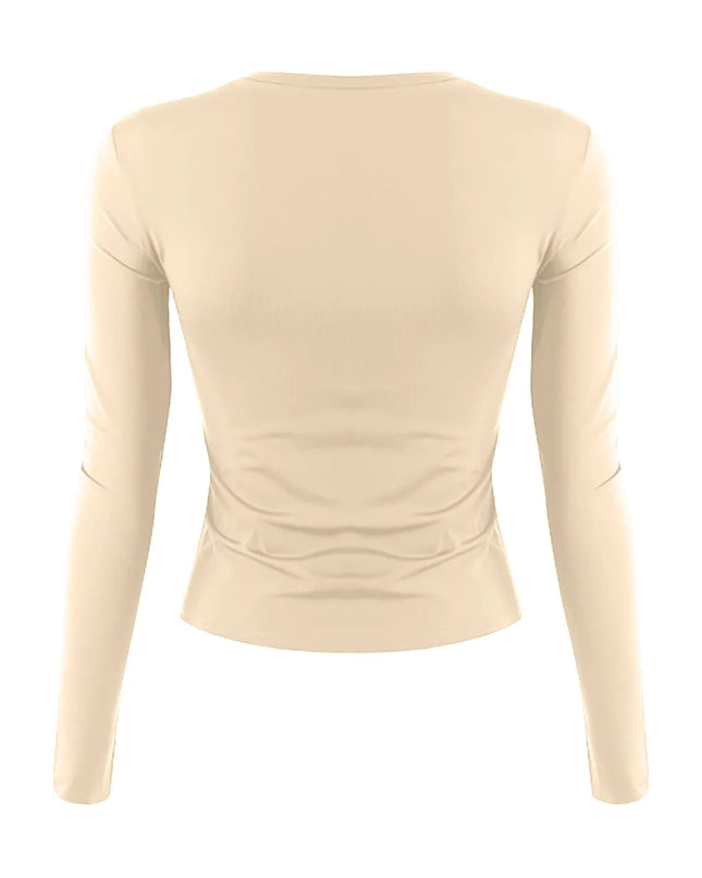 Womens long sleeve crop top in a light beige color with a slim fit and classic O-neckline, showcasing the back design.