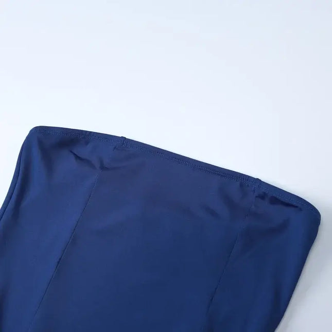 Detail of the sexy strapless summer dress showcasing its elegant neckline and smooth fabric texture.