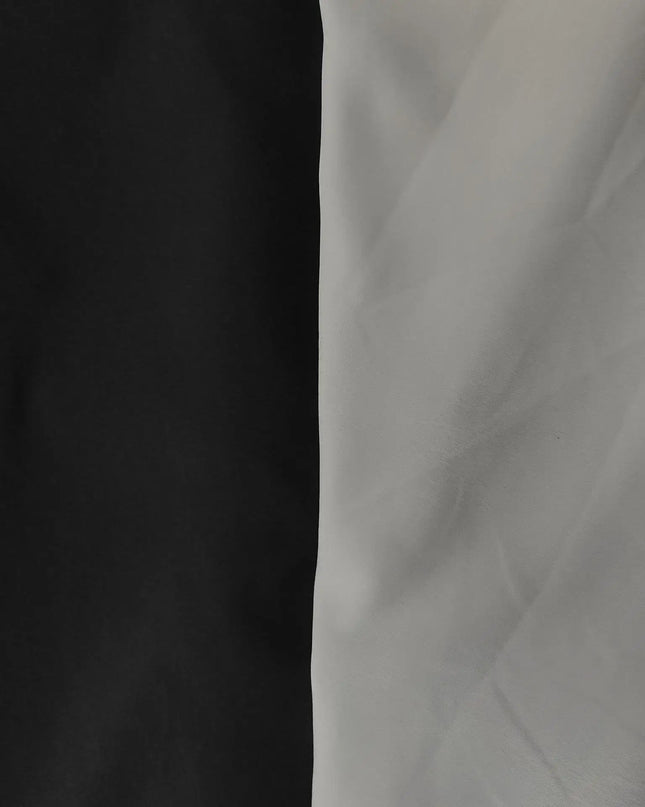 Close-up of black and white fabric showcasing the color contrast of the evening party dress.