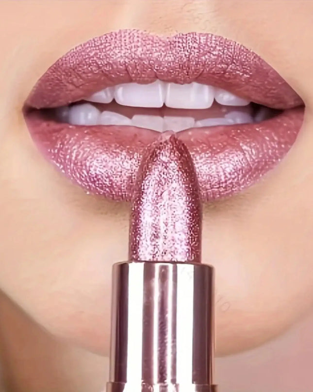 Close-up of a person applying pink lipstick with a matching lipstick visible.