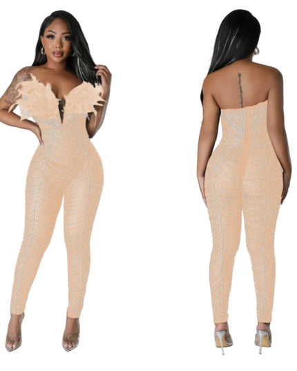 Woman wearing a beige jumpsuit with lace details, shown from front and back on a white background.