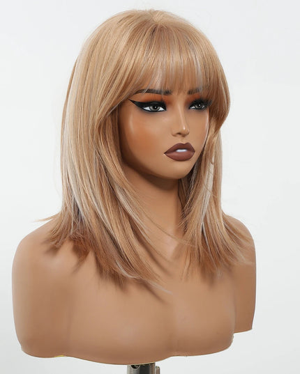 Blonde wig with bangs on a mannequin head against a white background