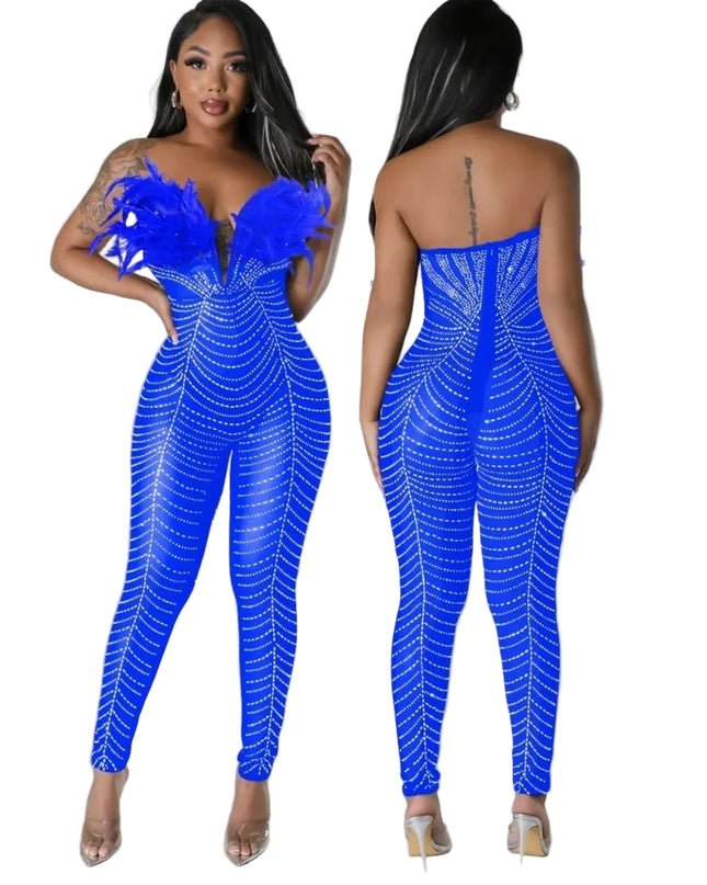 Blue rhinestone jumpsuit worn by a model on a plain background